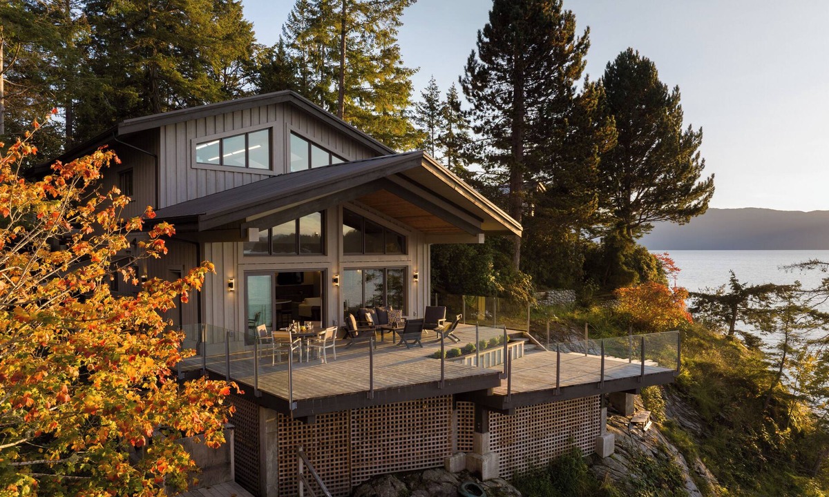 Madeira Park Cottage | A serene waterfront perch! Panoramic sunsets, huge deck with cliff-hung hot tub