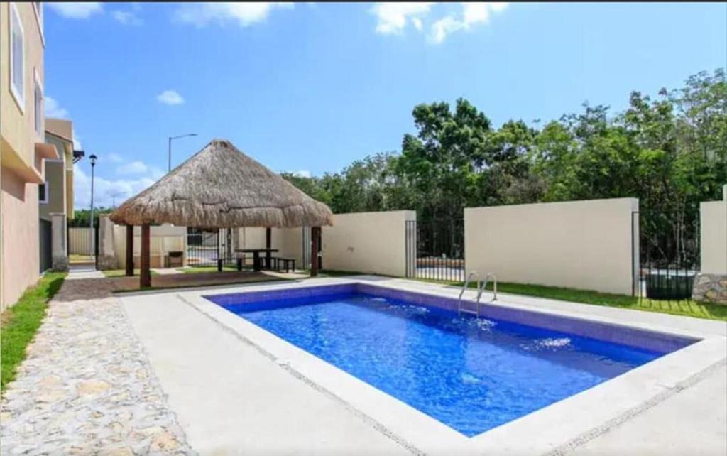 Puerto Juarez Apartment | Amplio Departamento a 10 Min de la Playa con Alberca e Internet