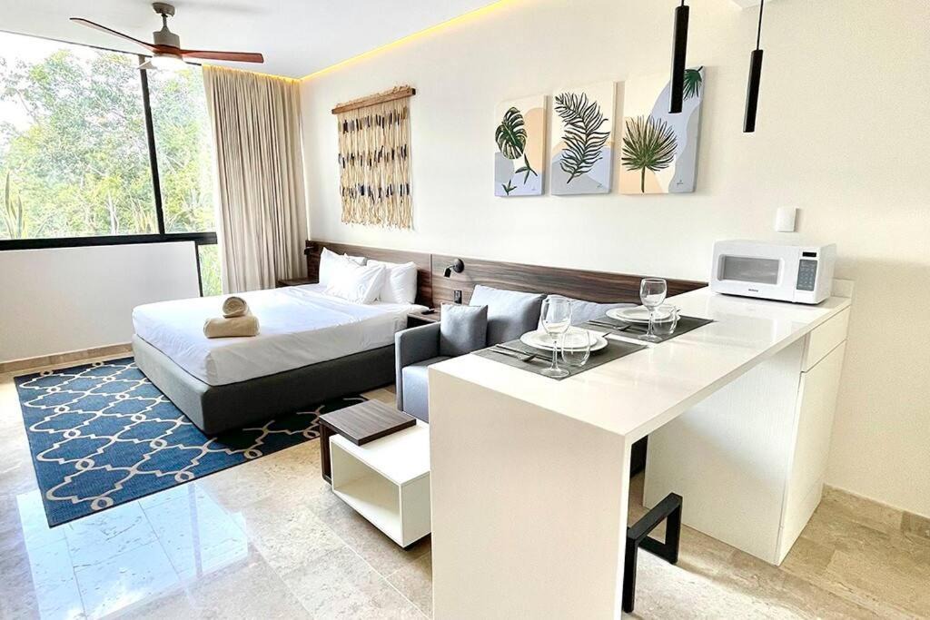 Zama Apartment | Fresh and Stylish Studio Aldea Zama rooftop pool Mya 109