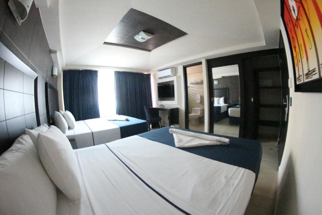 Hotel Portonovo Plaza Malecon | Colonia 5 de Diciembre