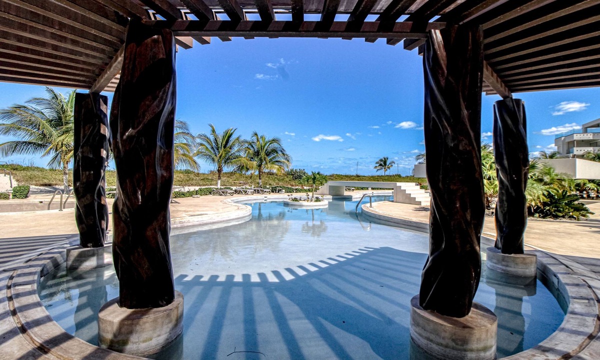 Telchac Puerto Apartment | Luxe apartment with on-site pools, sundeck, & beach access