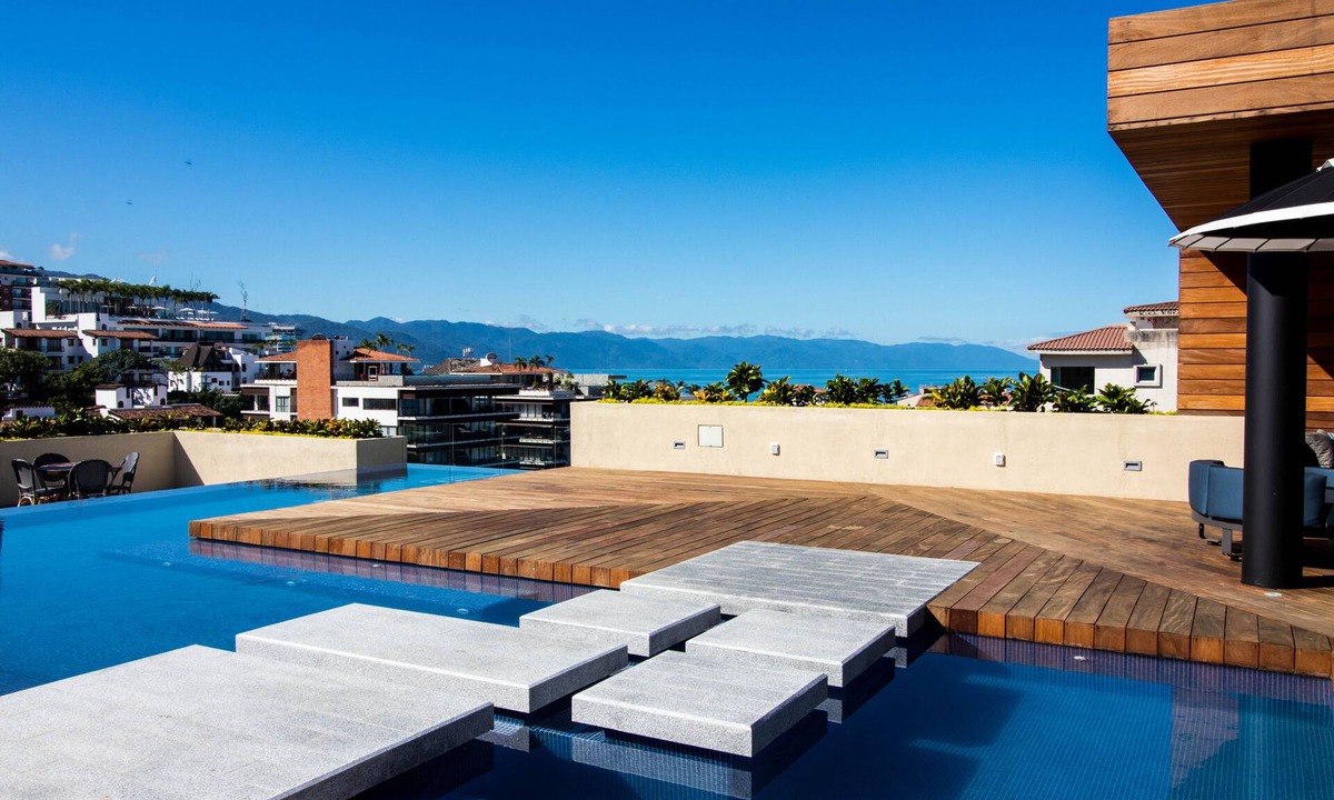 Emiliano Zapata Condo | Luxury condo steps to the boardwalk and the beach in the Romantic Zone