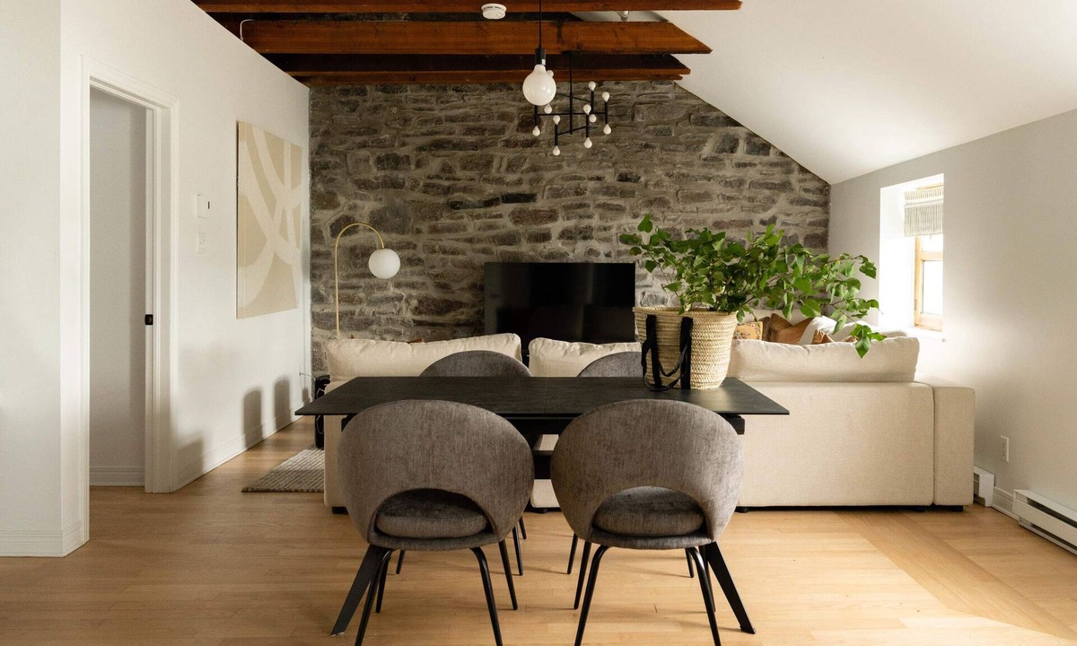 Ville-Marie Apartment | Maison Rasco One-Bedroom Apartment King Size Bed Old Montreal Full Kitchen Stone Wall Pet Friendly Self Check-In Access Wi-Fi AC