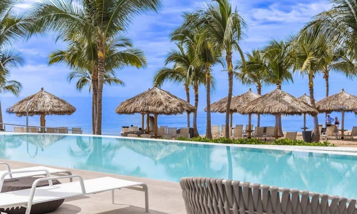 Flamingos Condo | Marítima Beach Condo, 2BR, Deluxe, 2 Pools, BBQ, Balconies & Great Amenities