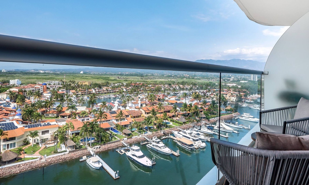 Isla Iguana Apartment | Modern, water & mountain view condo with huge balcony, rooftop pool, gym, & spa