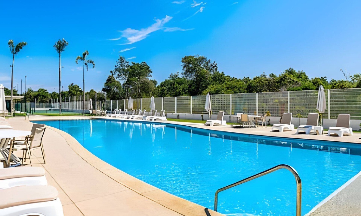 Flamingos Condo | New! Large balcony and pool, steps from the ocean
