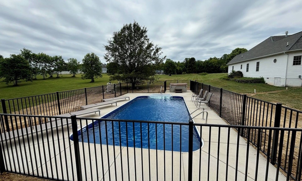 Livingston House | Peaceful, lakeside retreat-private pool, hot tub, private dock, boatslip & more!