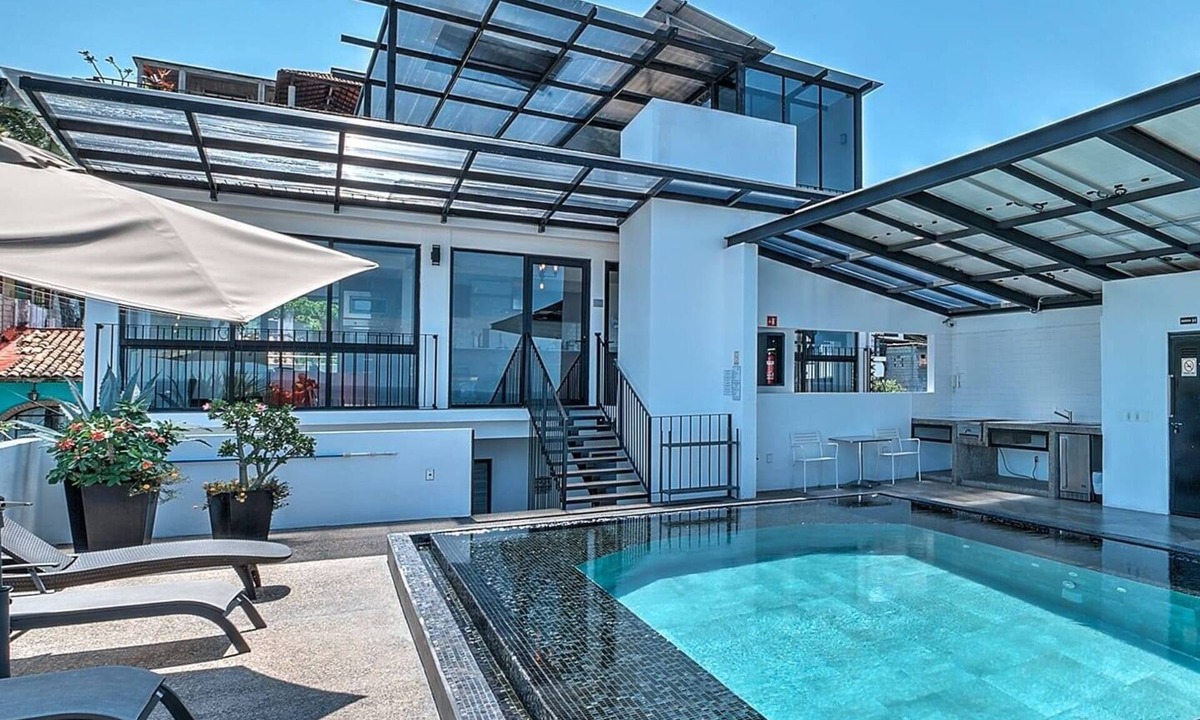 Colonia 5 de Diciembre Condo | Penthouse Condo with Private Rooftop Terrace. Short walk to the Beach & Malecón.