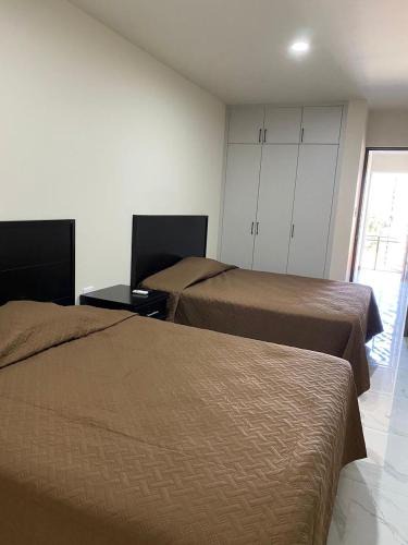 Guadalupe Apartment | Suites 115