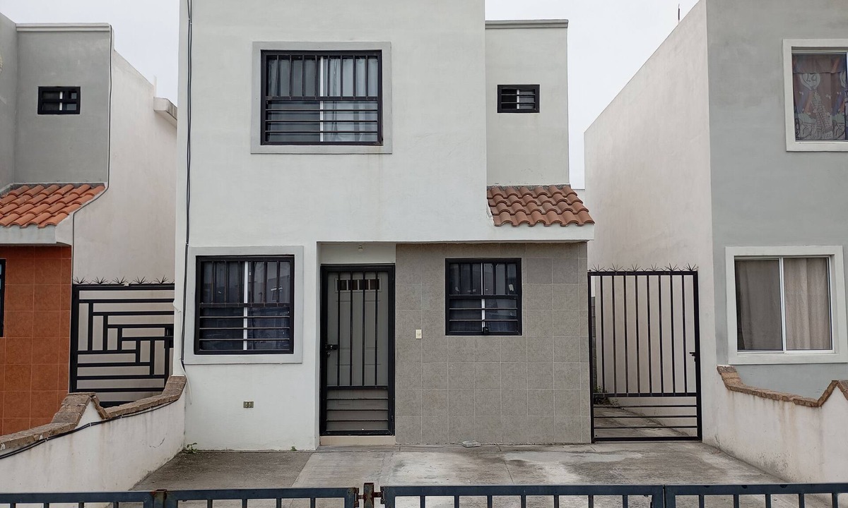 Apodaca House | Two-story house