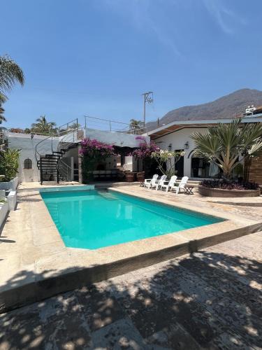 Raquet Club House | Villa Convivencia