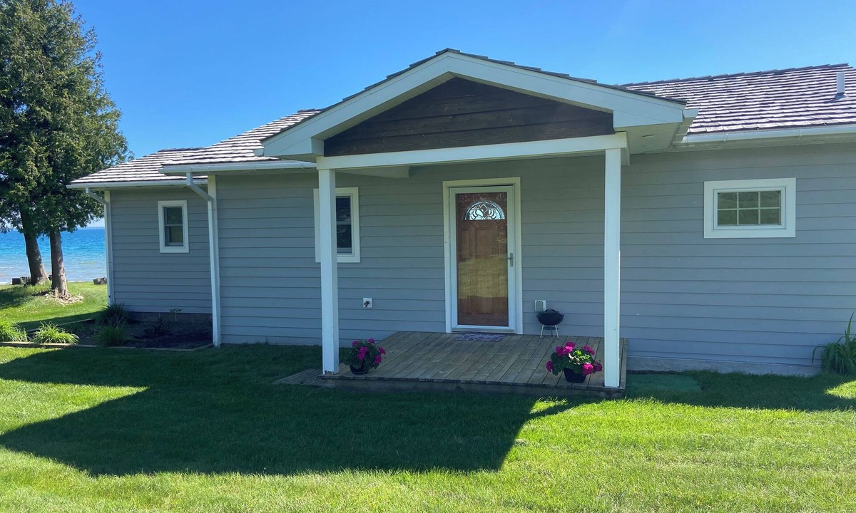 St Ignace House | Waterfront home on Lake Michigan with views of St Helena Island Lighthouse