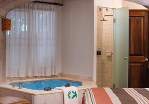 Colorful 3-BR Poolside Villa with a Private In-Room Hot Tub at Luxury Resort