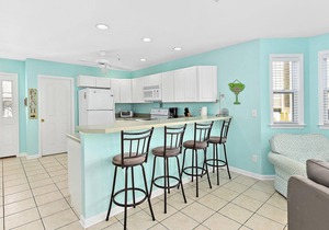Stylish, upscale 3 bedroom condo with a television in every bedroom and living room, free WiFi, and two floors located downtown only a few streets from the boardwalk and only steps to the beach!