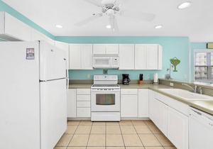 Stylish, upscale 3 bedroom condo with a television in every bedroom and living room, free WiFi, and two floors located downtown only a few streets from the boardwalk and only steps to the beach!