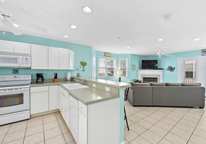 Stylish, upscale 3 bedroom condo with a television in every bedroom and living room, free WiFi, and two floors located downtown only a few streets from the boardwalk and only steps to the beach!