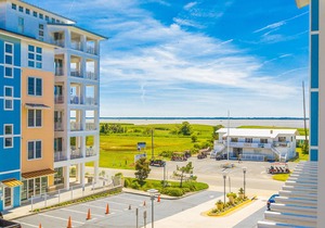 Updated condo with balcony & pools - steps to the beach