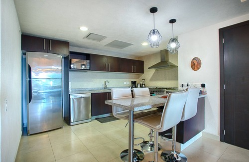 South Hotel Zone Condo | Balcony, Pools, Gym, Restaurant | Beachfront 2BR