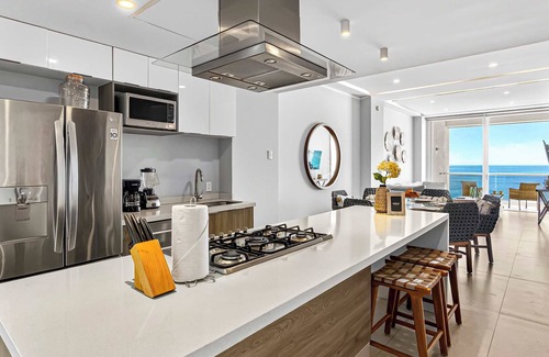 Las Glorias Apartment | Beachfront 2BR - Pools & Scenic Balcony Views