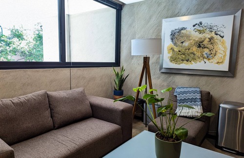 Escandon Apartment | Beautiful Business Condo in the heart of Condesa | Indoor waterfall