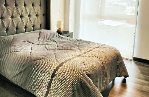 Anahuac Apartment | Beautiful Hi-rise, King size, HS Wi-Fi, pool, gym