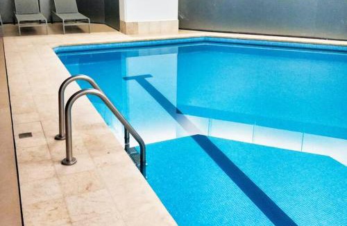 Anahuac Apartment | Beautiful Hi-rise, King size, HS Wi-Fi, pool, gym