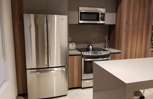 El Medano Ejidal Condo | Best Location in Downtown Cabo, New Luxury Condo w/jacuzzi. Fall discounts!