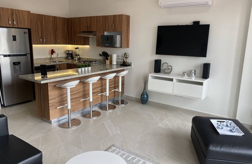 North Hotel Zone Condo | Charm & Champagne with a little R&R