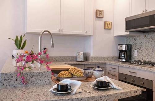South Shore Hotel Area Apartment | Designer Remodeled Beachfront Retreat, Ocean Views