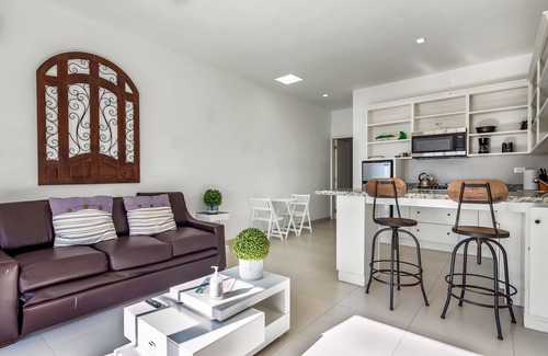 La Paloma House | Dog-friendly suite with kitchenette, heated outdoor pool, hot tub, private patio