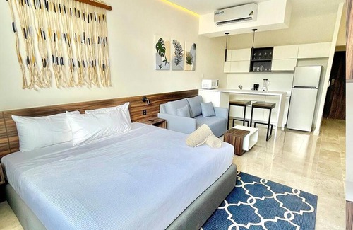 Zama Apartment | Fresh and Stylish Studio Aldea Zama rooftop pool Mya 109