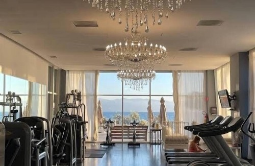 North Hotel Zone Condo | Fun and Vibrant Family Style Beachfront Condo!