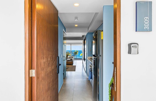 Las Glorias Apartment | Gorgeous 1BR Condo with Pools & Sea Views