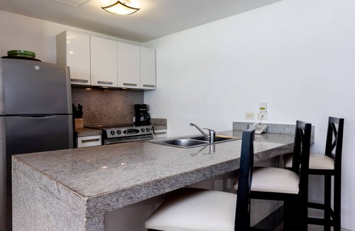 Puerto Juarez Condo | Ground Floor Unit with Views of the gardens and pool at The Elements by BRIC