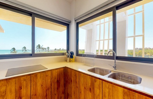 Telchac Puerto Apartment | Gulf-view getaway with a furnished terrace, pool, & easy beach access
