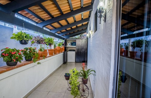 North Hotel Zone Condo | Hibiscus Suite ~ A Villa Garden