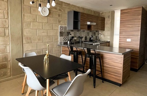 Downtown Guadalajara Apartment | Loft minimalista con acceso al gimnasio y servicios de coworking