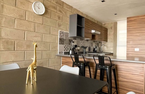Downtown Guadalajara Apartment | Loft minimalista con acceso al gimnasio y servicios de coworking