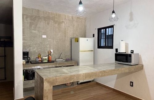 Zona Dorada Apartment | Loft One Street from the Beach By PartnerHostRentas
