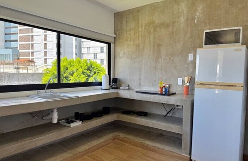 Zona Dorada Apartment | Loft Steps from the Beach By PartnerHostRentas