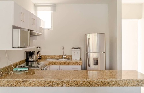Progreso Municipality Condo | Luxury Condo, 200Mbps Fiber optic, Progreso East, steps from the beach
