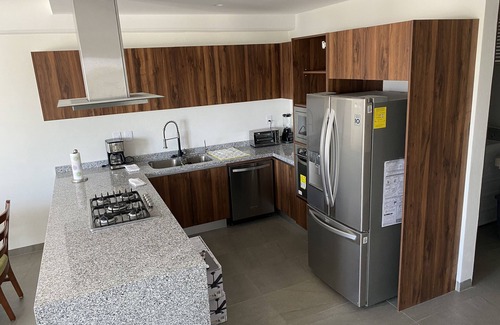 Flamingos Apartment | Luxury Condo located inside a residential area a few minutes away from the beach