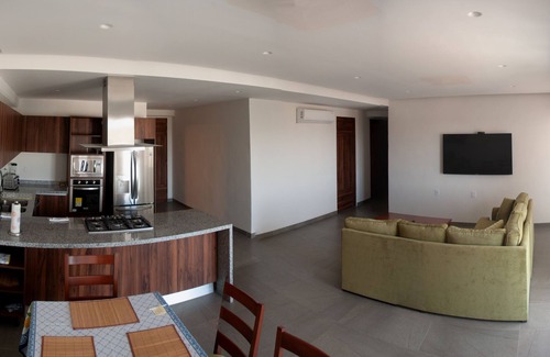 Flamingos Apartment | Luxury Condo located inside a residential area a few minutes away from the beach
