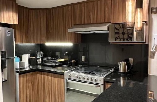 Colonia Cuauhtemoc Apartment | Mid-Century's Morning Embrace: Revel in 'Nowness' Amidst Roma's Radiance.n