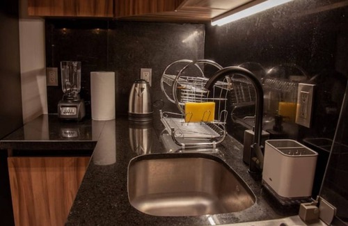 Colonia Cuauhtemoc Apartment | Mid-Century's Morning Embrace: Revel in 'Nowness' Amidst Roma's Radiance.n