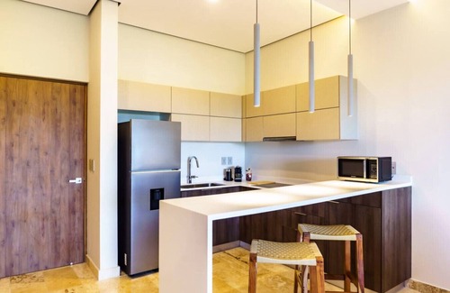 Playa Paraiso Apartment | New 2Bdr unit step away from the Caribbean beaches