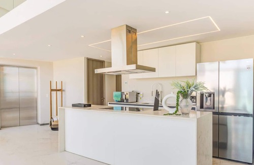 Flamingos Apartment | NEW Beachfront Marítima Penthouse with 2 Pools and Gym