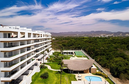 Flamingos Condo | New! Large balcony and pool, steps from the ocean