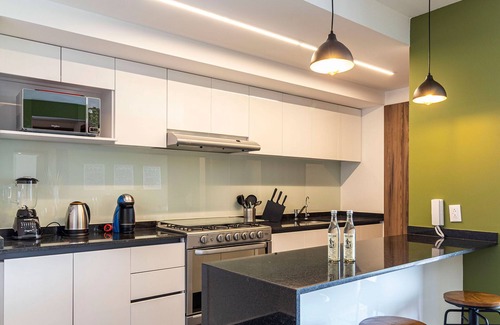 Hipodromo Condesa Apartment | Taman by Kukun Summar