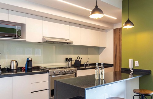 Hipodromo Condesa Apartment | Taman by Kukun Summar